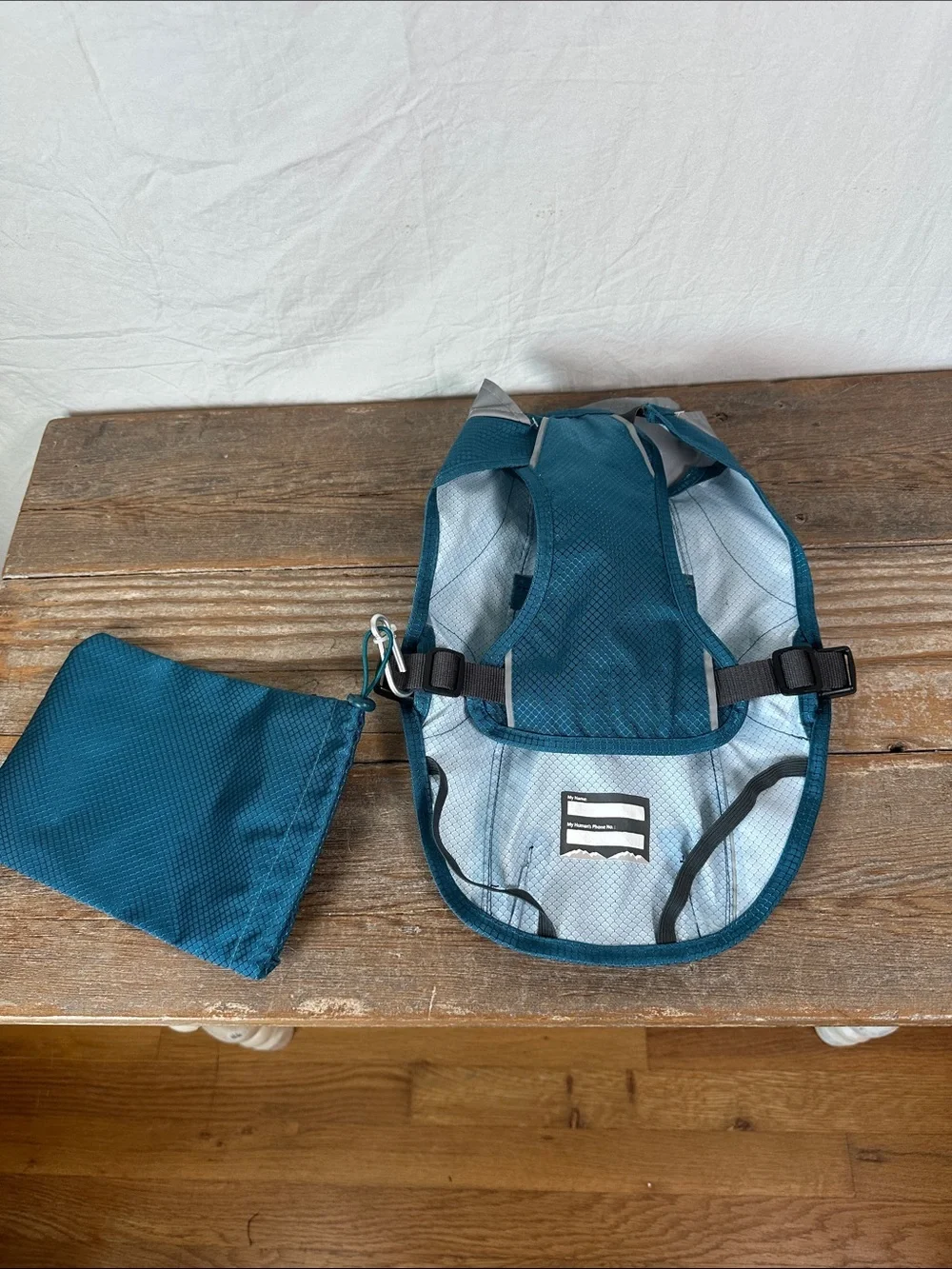 Teal Dog Jacket with Reflective Silver Panel and Matching Pouch